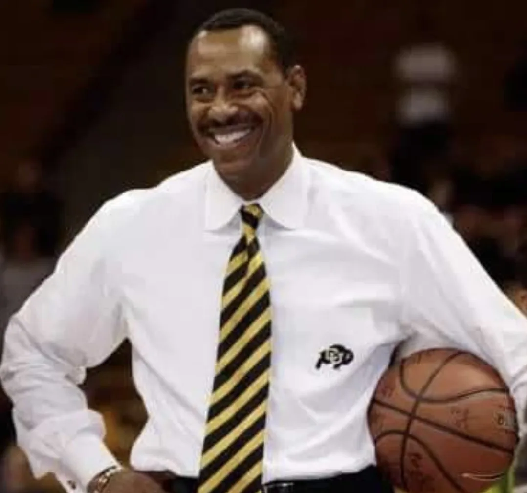 Coach Ricardo Patton on the Colorado sideline with a basketball